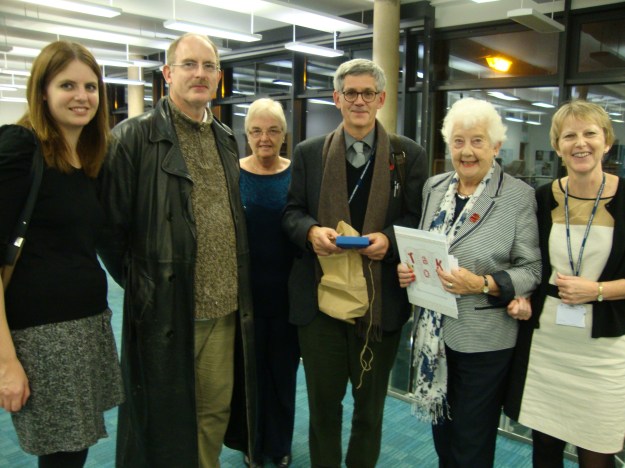 Following his resignation, members of the Friends present John Goldsmith, Curator of the Cromwell Museum between 1985 and 2014, with two Commonwealth coins. 